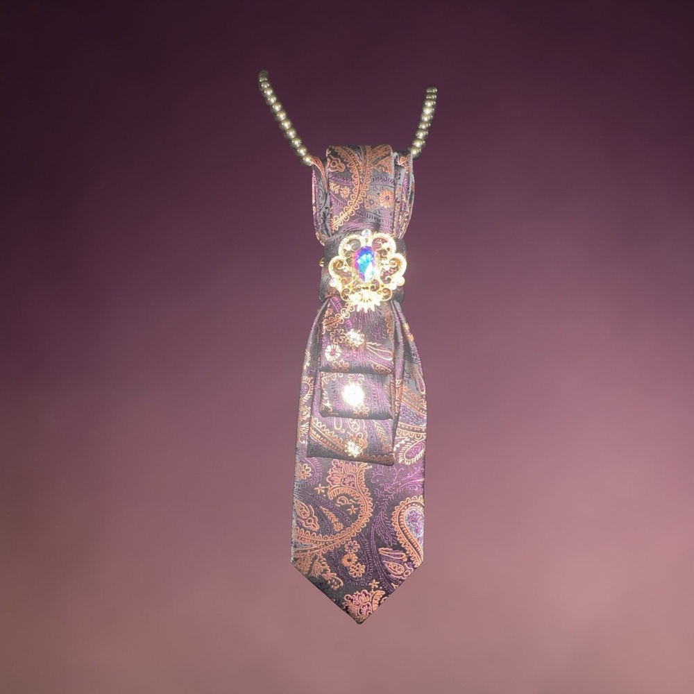 Purple Paisley Necktie with Decorative Brooch